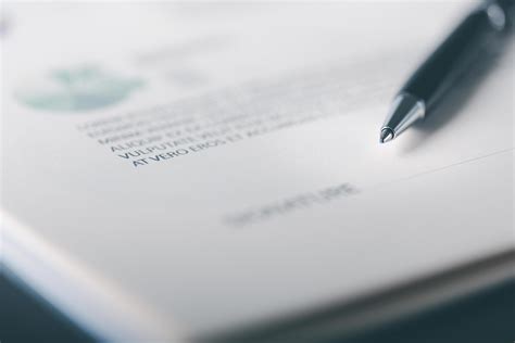 pen and papers placed on the table,documents concept contract agreement ...