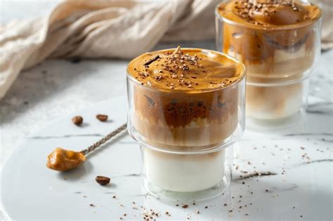 Premium Photo | Dalgona coffee. drink with coffee foam and milk.