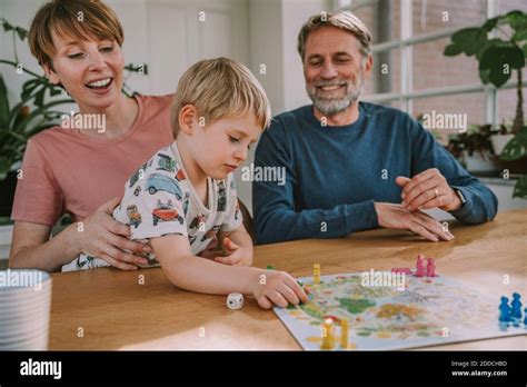 Mother and son playing board game hi-res stock photography and images ...