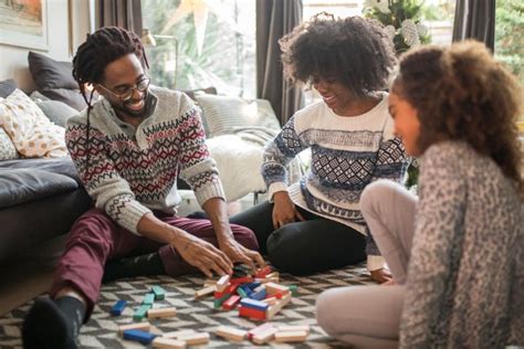 Which cozy family games truly engage both young kids & adults without squabbles?