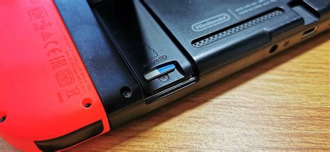 How To Insert A MicroSD Card Into A Nintendo Switch - GameSpot