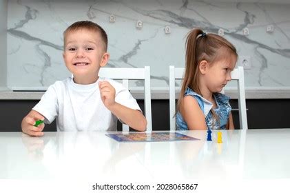 3 Frustrated Child Lost Board Game Royalty-Free Images, Stock Photos ...