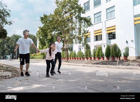 Happy Family Enjoying Outdoor Activities Together for Wellness and ...