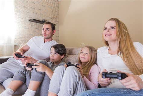Family playing video game stock image. Image of father - 113506683