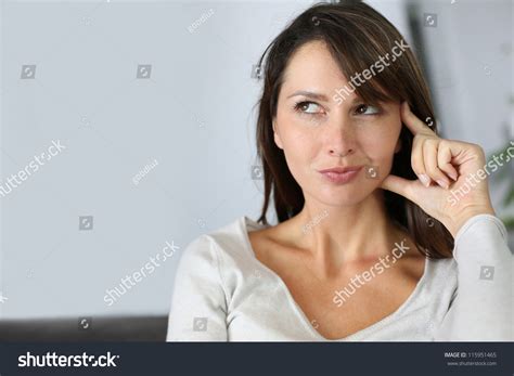 Beautiful Woman With Thoughtful Look Stock Photo 115951465 : Shutterstock