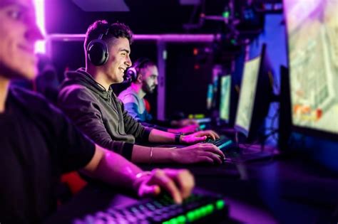 Premium Photo | Happy gamer playing favorite game at gaming room