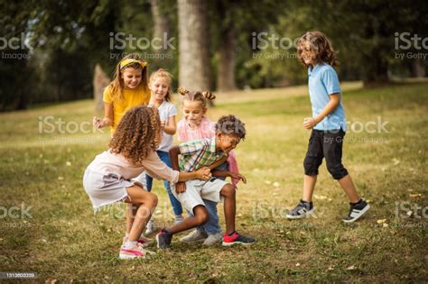 Kids Playing Together Stock Photo - Download Image Now - Child, Playing ...