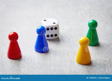Colored Board Game Pieces on Stone Table Stock Image - Image of ...