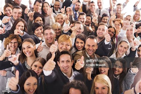 Large Group Of People Smiling And Giving Thumbs Up High-Res Stock Photo ...