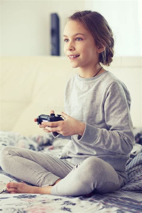 Child playing video game stock image. Image of controller - 49931999