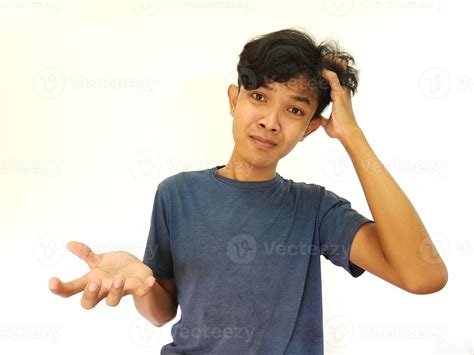 Asian man with confused gesture 22775788 Stock Photo at Vecteezy
