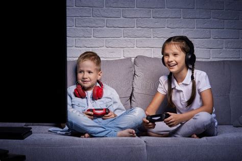 Children Playing Video Game with Game Console Stock Photo - Image of ...