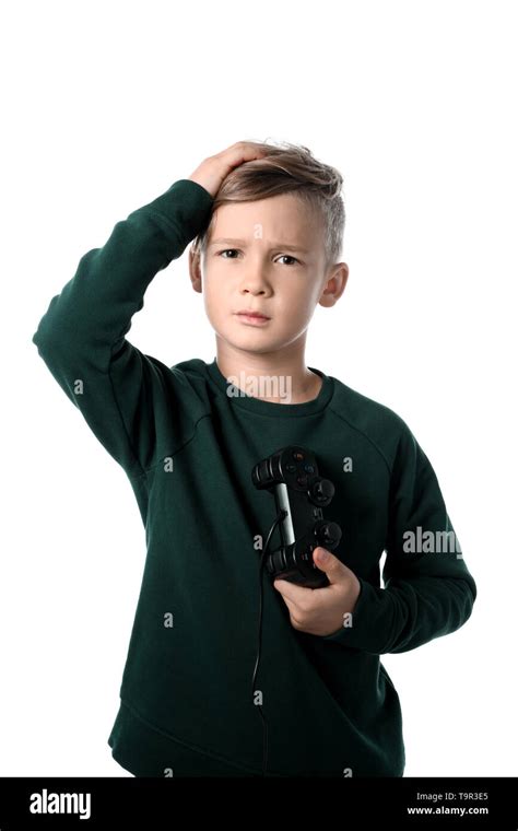 Sad boy after losing video game on white background Stock Photo - Alamy