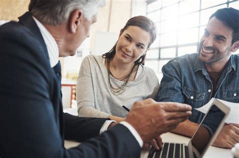They Know Where To Go for Expert Advice. a Young Married Couple ...