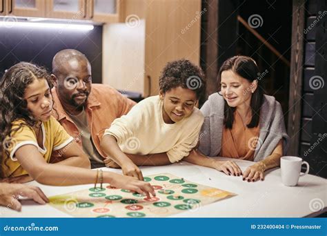 Family Playing Board Game Together Stock Photo - Image of family ...