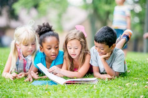 Kids Reading Together Stock Photos, Pictures &amp; Royalty-Free Images - iStock