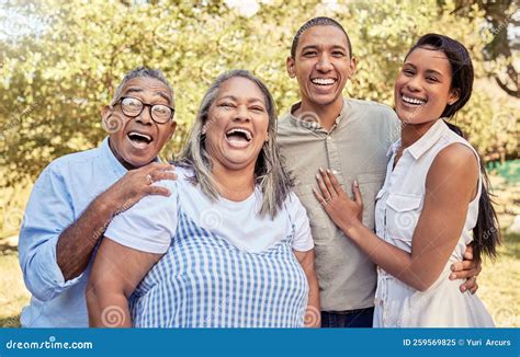 Happy Family, Laughing and Relax at a Park Together with Couple Bonding ...