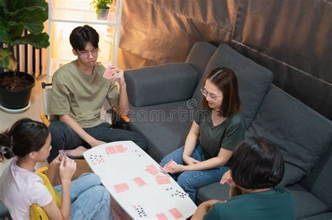 Asian Family Playing Games Together, Diverse People Playing a Card Game ...