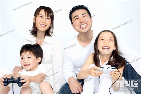 Children playing the game with parents, Stock Photo, Picture And ...