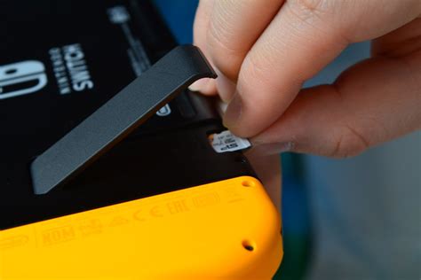 How to put an SD card in a Nintendo Switch - Android Authority