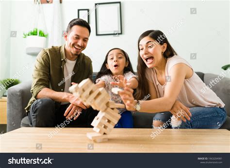 Surprised Family Laughing While Losing Board Stock Photo 1963204981 ...