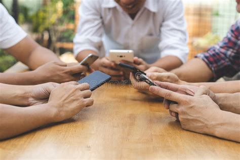 Group of Friends Playing App Games in Mobile Phone and Online Together ...