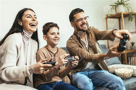 Family Playing Video Games at Home and Having Fun Together Stock Image ...