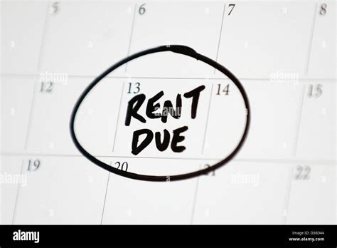 Rent due circled on a calendar Stock Photo - Alamy