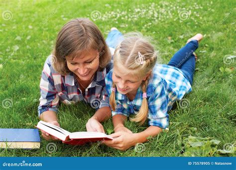 Parent and Child Reading Books Together Stock Image - Image of laughing ...