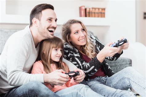 Parents play video games with their children Stock Photo 04 free download