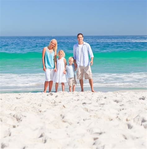 Portrait Of A Family On The Beach Stock Image - Image of daughter ...