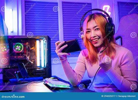 Happy Gamer Playing Video Game Online with Smartphone she Raises Hands ...