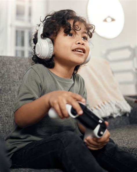 23,200+ Kids Playing Video Games At Home Stock Photos, Pictures ...