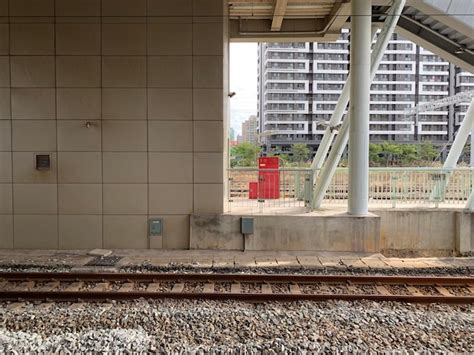 Premium Photo | Railroad tracks by building