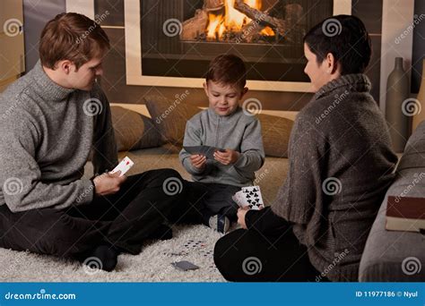 Young Family Playing Card Game Stock Photo - Image of children, indoor ...