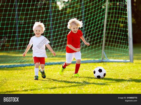 Kids Play Football On Image &amp; Photo (Free Trial) | Bigstock