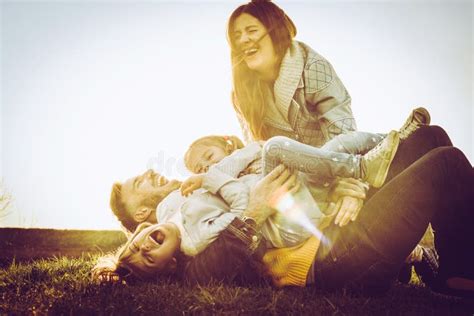 Happy Family Playing Together on Grass. Stock Image - Image of parent ...