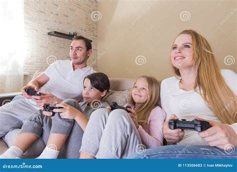 Family playing video game stock image. Image of father - 113506683