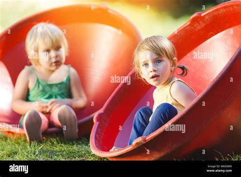 Children playing together outdoors Stock Photo - Alamy