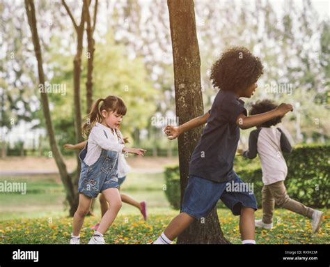 kids playing outdoors Stock Photo - Alamy