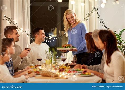 Happy Family Having Dinner Party at Home Stock Image - Image of eating ...