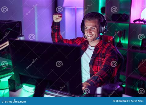 Young Caucasian Man Streamer Playing Video Game with Winner Expression ...