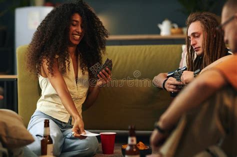 Enjoying Game Night with Friends in Cozy Living Room Stock Photo ...