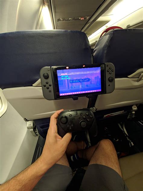 A little late, but this how I play Switch on a plane : kindafunny