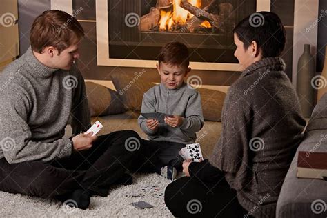 Young Family Playing Card Game Stock Photo - Image of children, indoor ...