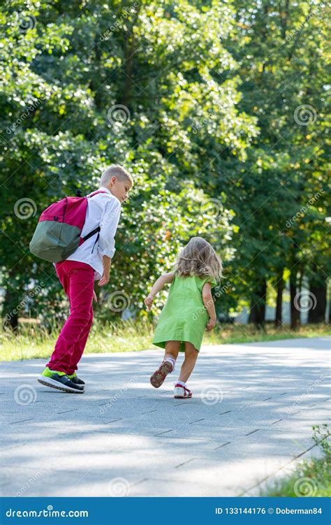 Happy Laughing Children Playing and Having Fun in the Park. Outdoors ...
