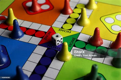 Playing Board Games With Dice Colorful Board And Pieces Stock Photo ...
