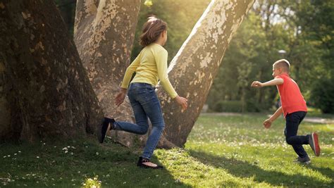 Young Children Playing Outdoors